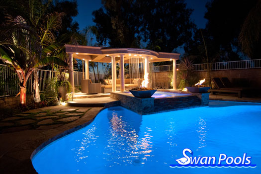 Swimming pool remodel with new built in spa.  Fire, pergola, and outdoor living in grand style, Laguna Hills, California.