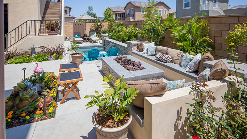 Custom swimming pool design with separate spa in California Wine Country.  Toast the evening lounging in your custom built spa.  Details in the construction project include raised spa, concrete coping, pebble interior plaster, artificial rocks, and waterway theuraputic jets. 